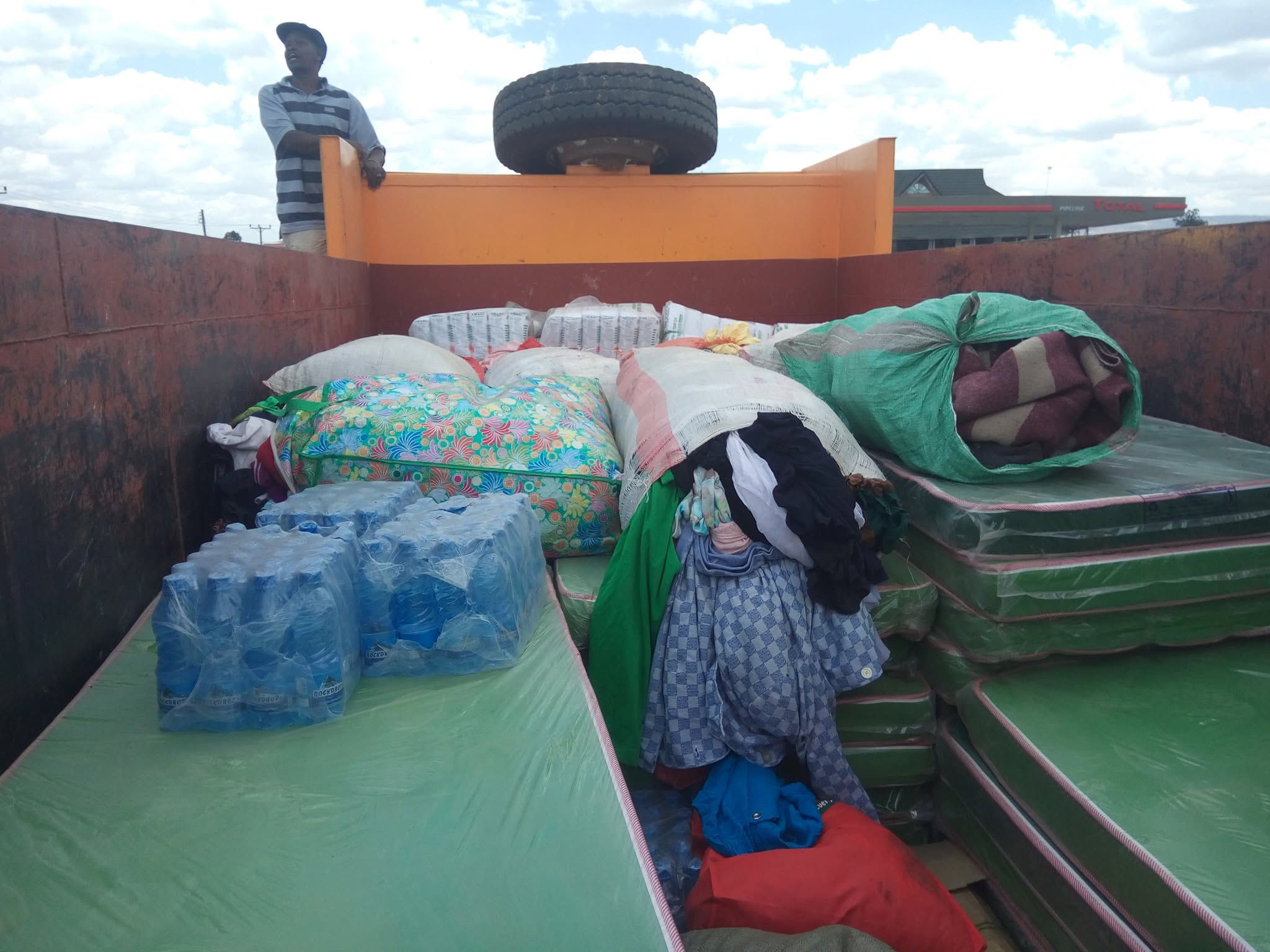 The yellow truck provided by the Nakuru County Government for Relief Materials Transportation0